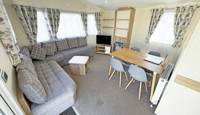 Modern and contemporary 12ft-wide caravan with two twin.