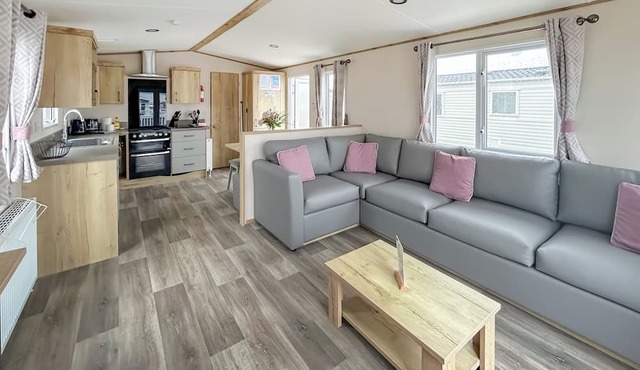 Modern and contemporary 12ft wide caravan with one double and one twin.