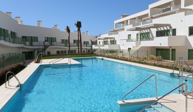 Modern Apartment with Wifi in Frontline Complex with Pool, & private parking