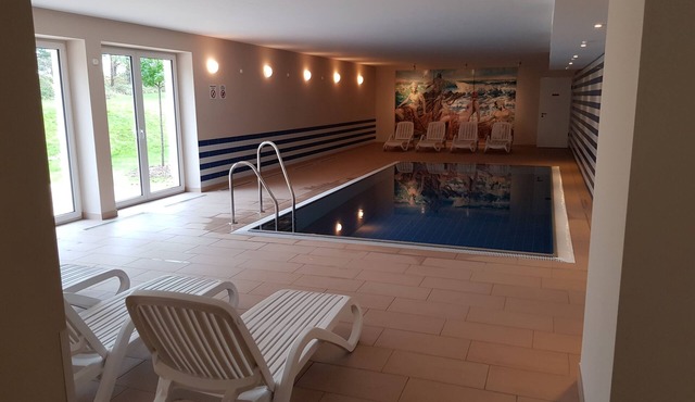 Modern apartment in direct beach location/POOL/sauna/W-LAN, parking included