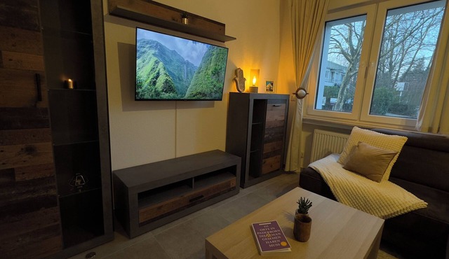Modern apartment with forest flair and coffee enjoyment