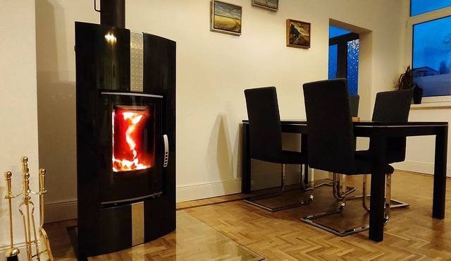 Modern apartment with fireplace, e-charging station and free parking space