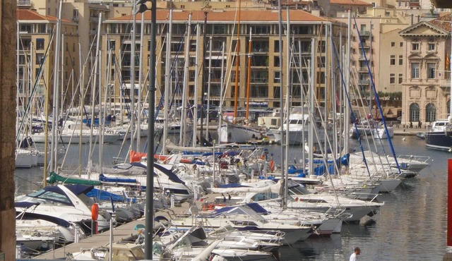 Modern apartment with a side view of the old harbor