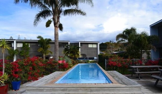 Modern beach front apartment at Aqua Soleil complex with lap pool & spa.