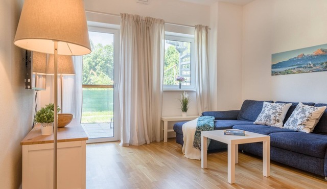Modern, central apartment with terrace ideal for families, groups & guests with dogs