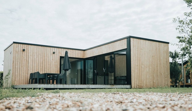 Modern chalet with terrace, located in a holiday park 800 m. from the beach