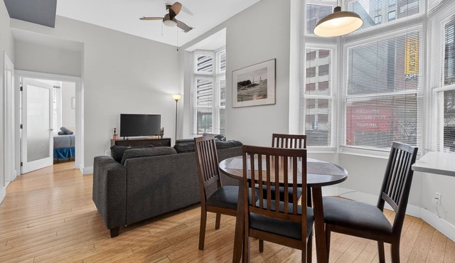 Modern Corner 1BR w/Views | Near Harbor & Stadium