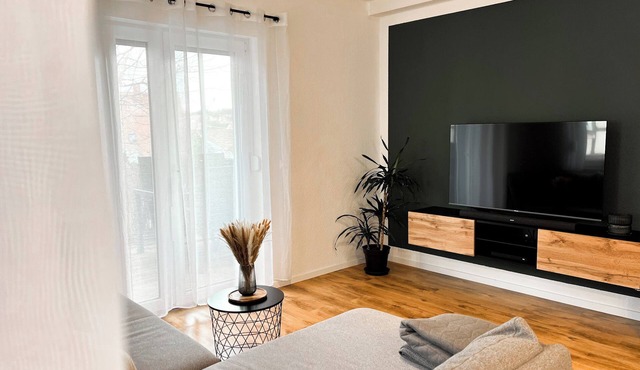 Modern, cozy apartment in Sulzdorf with WLAN & close to shopping center