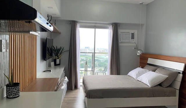Modern & Cozy Minimalist Space with Balcony