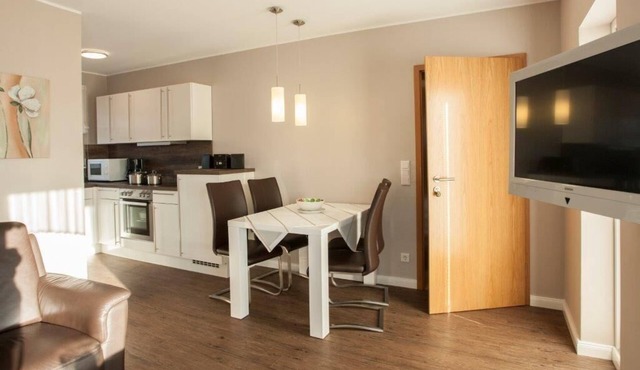 Modern 60sqm apartment with south-facing balcony, free WiFi
