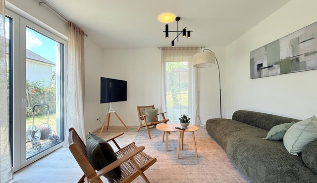 Modern Harmony suite with covered terrace near the lake and beach in Uhldingen-