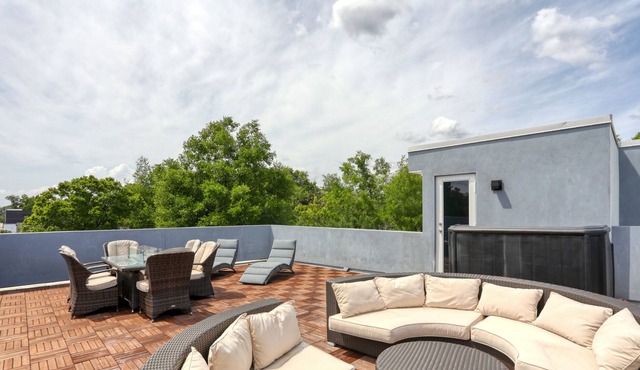 Modern hideaway with rooftop deck, firepit, game room, enclosed yard & WiFi