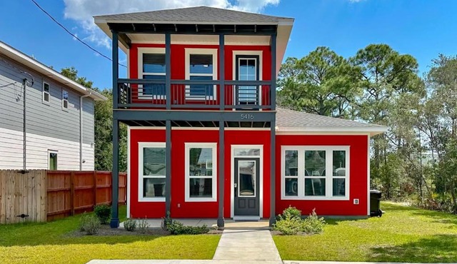Modern home with large backyard deck and close to the beach