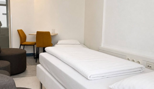 Modern Hotel Room Steps from Rennweg Station