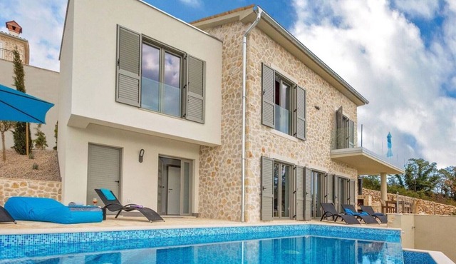 Modern house in a charming little village with sea views