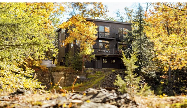 Modern interiors with beautiful view of mountains and a private bluestone quarry