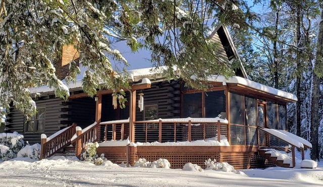 Modern log cabin sited on six acres of land, private and secluded, serene...