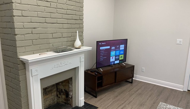 Modern lower level midtown apartment with cable and high speed internet!