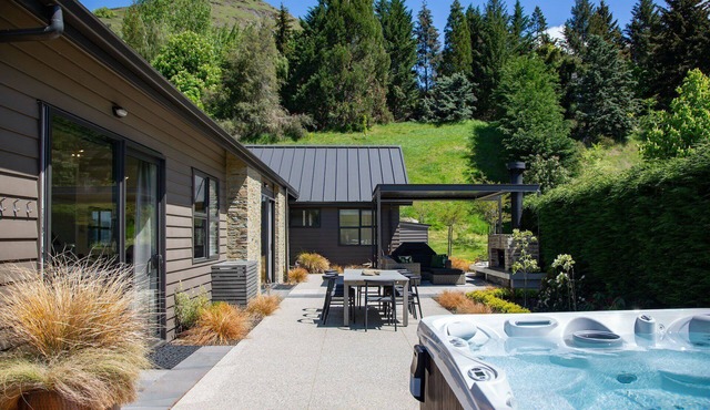 Modern luxury with spa pool, outdoor fireplace, table tennis and darts
