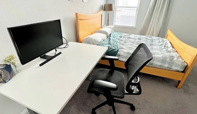 Modern, pristine house with central AC, workstation, and washer dryer in unit