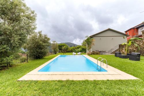 Modern retreat with pool and garden