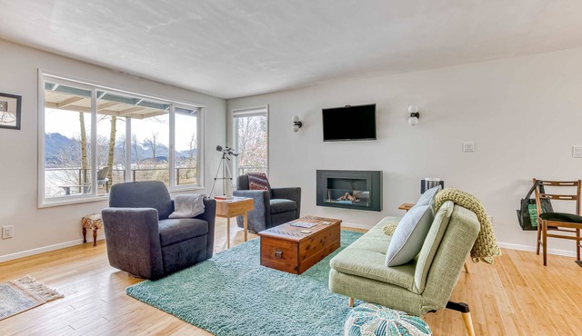 Modern, river-view home with 2 decks, Ping-Pong, fireplace & washer/dryer