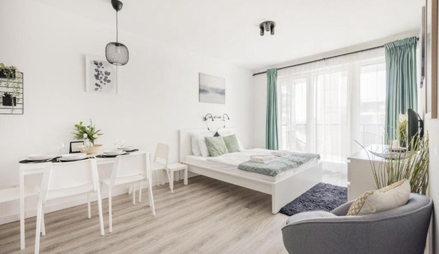 Modern Riverfront Apartment with Free Parking