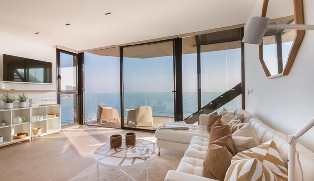 Modern sea front jacuzzi Blue Sky