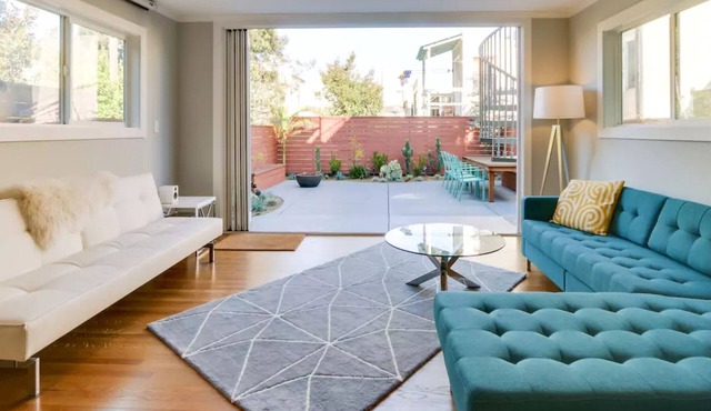 Modern, spacious tri-level house with roof deck views, garden, and free parking