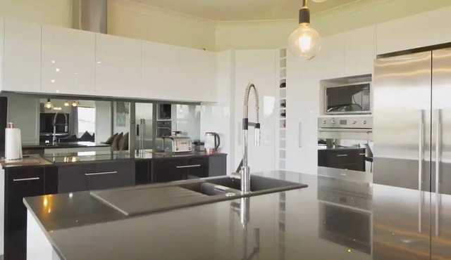 Modern & Spacious Upper Level Apartment with views