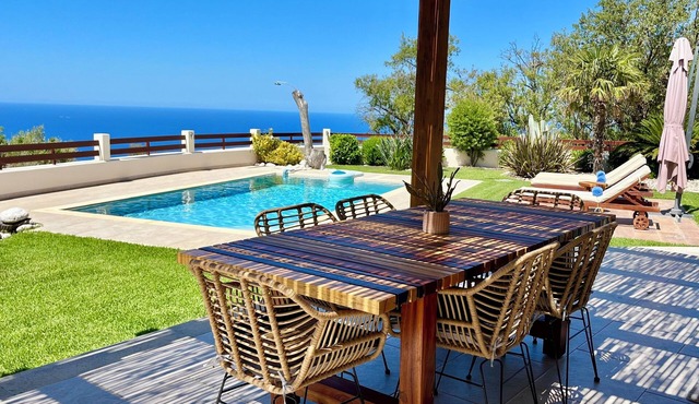 Modern spacious villa with private pool, large garden and sea view/sunset