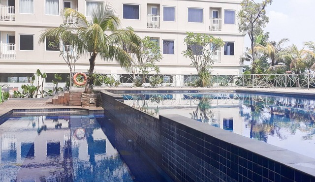 Modern Studio at Titanium Square Apartment