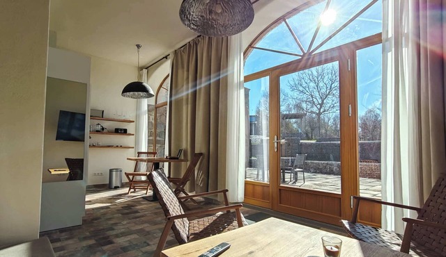 Modern studio with sun terrace and barrel sauna