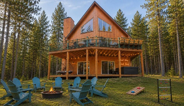 Modern Torch Lake Retreat: Speakeasy, Hot Tub, Sauna, Golf Sim, Arcade & More