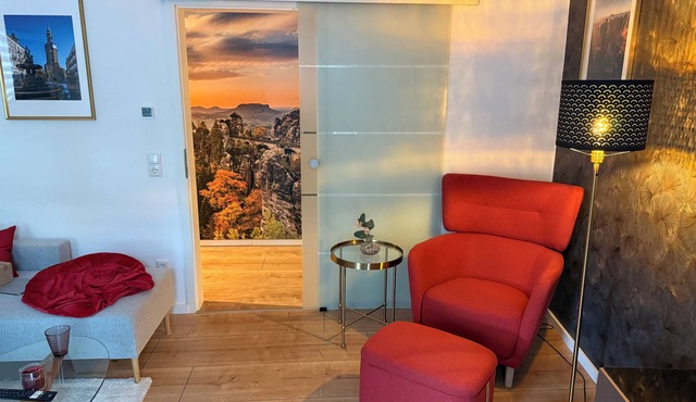 Modern vacation apartment, with parking space and terrace and barbecue