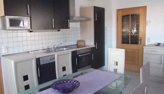 Modern vacation apartment for 6 people with balcony in a quiet location