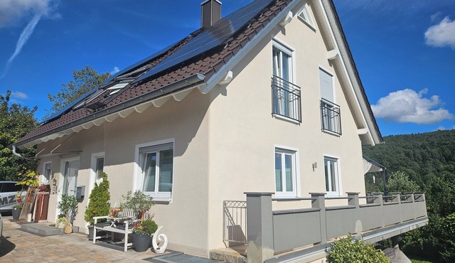 Modern vacation apartment in a very beautiful location, surrounded by forests and hiking trails!