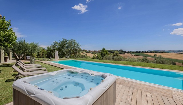 Modern villa with heated pool and Jacuzzi, near Ripe, just 20 minutes from the beach of Senigallia