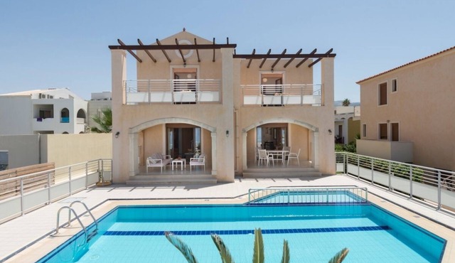 Modern Villa with Private Pool and Amazing Sea Views and just 100 meters to the Beach !