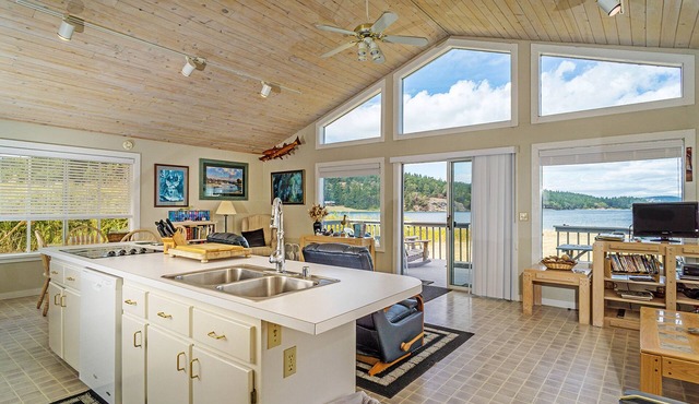 Modern waterfront home minutes from shopping, dining, & beaches