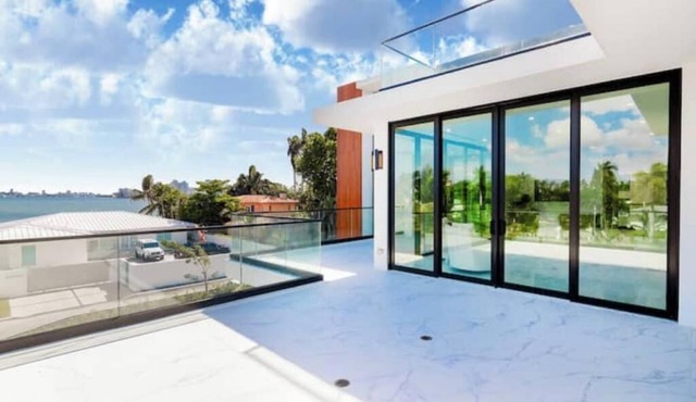 Modern Waterfront Villa w/Pool, Rooftop & dock