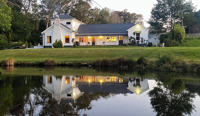 Modernized country house set in beautiful gardens with swimming pool. n