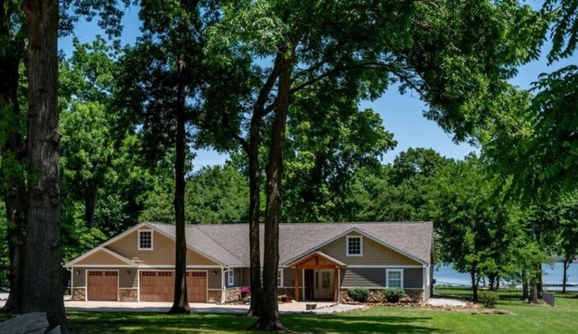 Monkey Island waterfront w/ private 2-slip dock, 250' shoreline, and hot tub