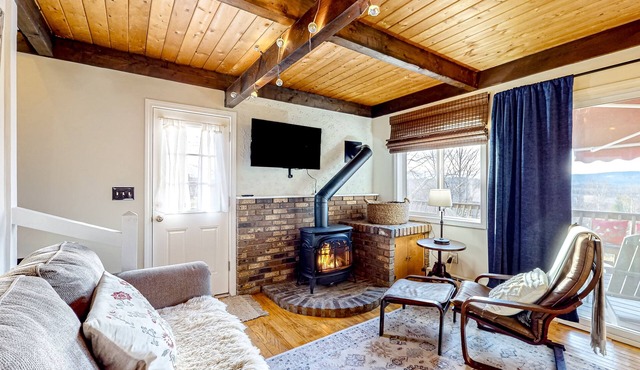 Mountain-view cottage with inviting deck, fireplace & washer/dryer