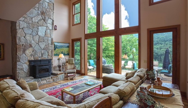 Mountain view home with expansive deck, pellet stove, hot tub and outdoor shower