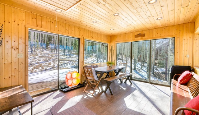 Mountain-view retreat on 200 acres with sunroom, wood stove & W/D - dog-friendly