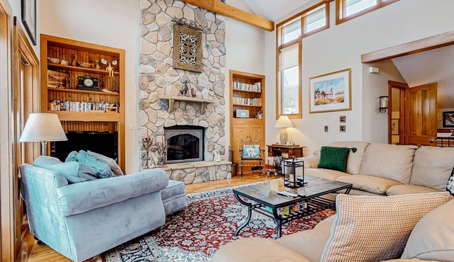 Mountain-view townhome with seasonal pool, ski shuttle, & private deck