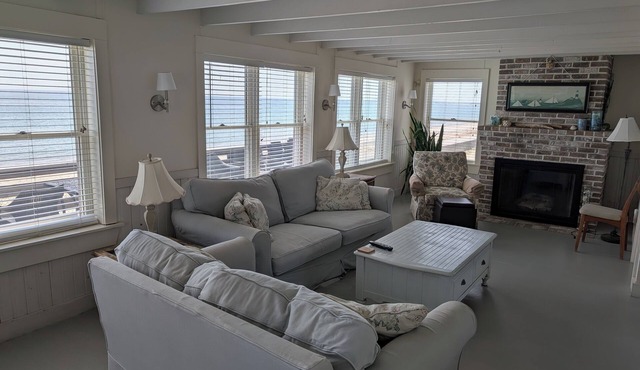 Nantucket Style oceanfront home directly on a sandy beach