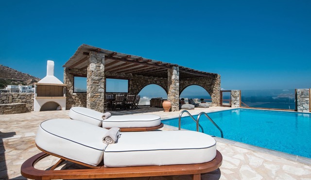 Natural Stone Villa has amazing view in town and aegean private pool free park