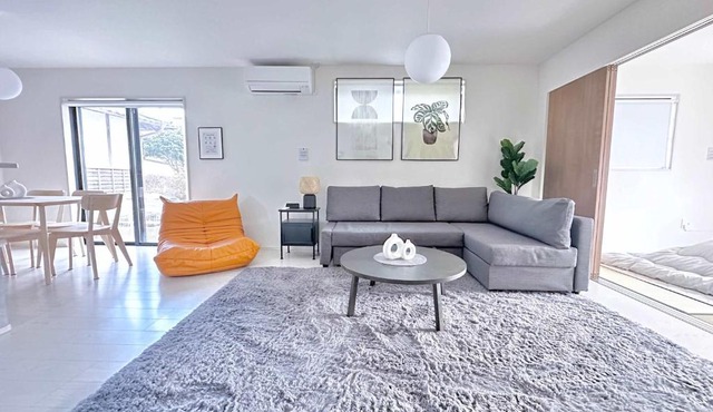 Near Airport and Aso Volcano Modern 4BR Residence by Restavio
